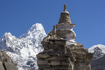 Image showing Buddhist stupa and Ama Dablam summit in Khumbu