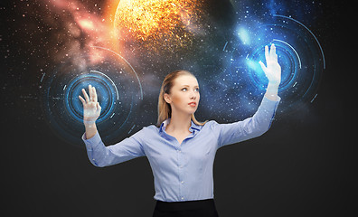 Image showing businesswoman with virtual space hologram