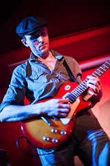 Image showing Band performs on stage in a nightclub