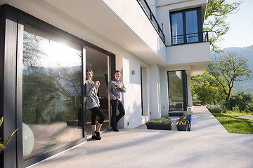 Image showing couple enjoying on the door of their luxury home villa