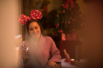 Image showing woman drinking champagne at spa