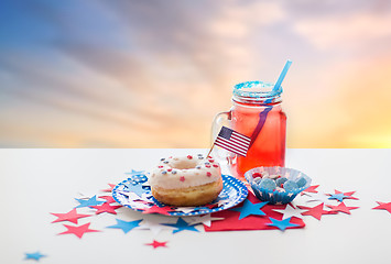 Image showing donut with juice and candies on independence day