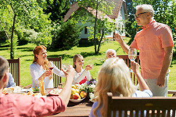 Image showing family gathering at summer garden and celebration