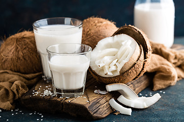 Image showing Fresh coconut milk in glass bottle, vegan non dairy healthy drin