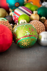 Image showing Christmas decoration glass balls on a wooden ground