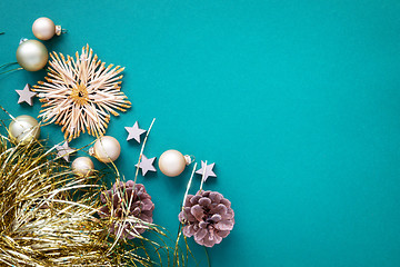 Image showing Christmas decoration background turquoise with straw star