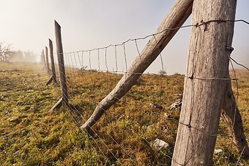 Image showing Fence on a field