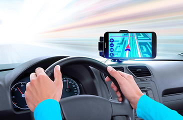 Image showing navigator on dashboard of car