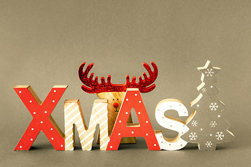 Image showing Christmas decoration with xmas text and hidden reindeer