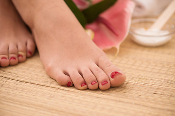 Image showing female feet at spa salon