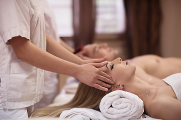 Image showing couple enjoying head massage at the spa