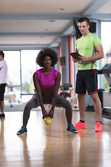 Image showing weights workout with personal trainer at  crossfit gym