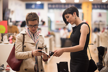 Image showing best friend shopping in big mall