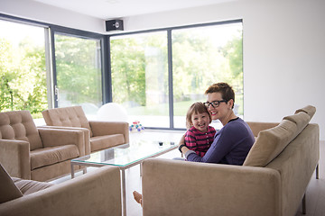 Image showing mother and cute little girl enjoying their free time