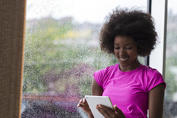 Image showing african american woman using tablet
