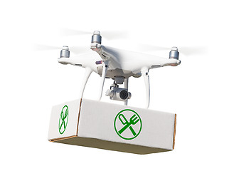 Image showing Unmanned Aircraft System (UAV) Quadcopter Drone Carrying Package