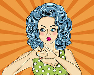 Image showing Pop art woman making heart sign with hands. Comic woman . Pin up