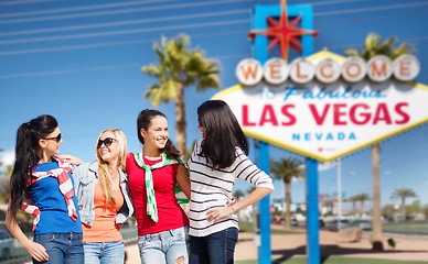 Image showing young women over welcome to las vegas sign