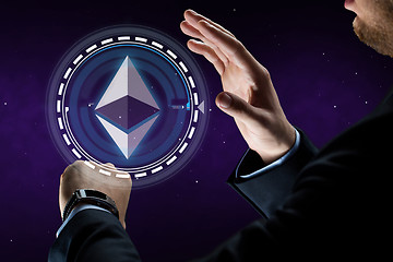 Image showing male hands with smart watch and ethereum hologram