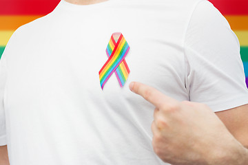 Image showing man with gay pride rainbow awareness ribbon