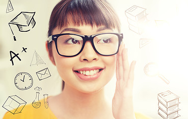 Image showing happy asian young woman in glasses at home