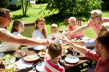 Image showing happy family having dinner or summer garden party