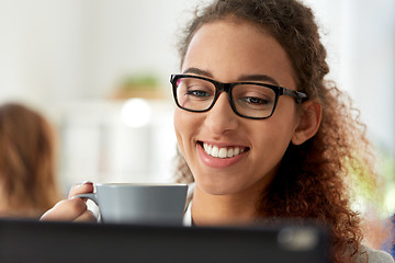 Image showing businesswoman with tablet pc and coffee at office