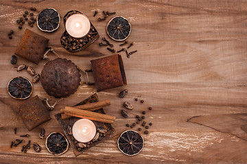 Image showing Vintage composition with rusty metal, candles and spices