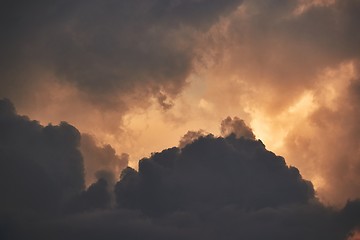 Image showing Black skies with sunlight glow