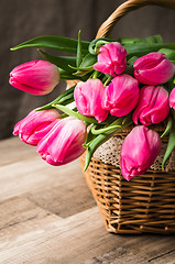 Image showing Beautiful bouquet from pink tulips  on a table