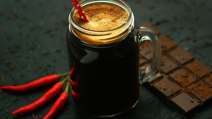 Image showing Beverage in mug and chocolate