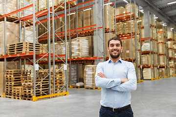 Image showing happy businessman at warehouse