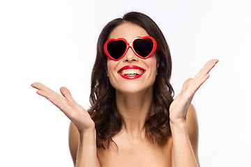 Image showing woman with red lipstick and heart shaped shades