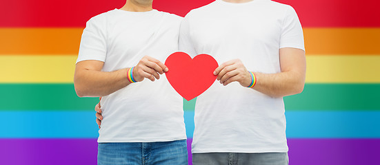 Image showing couple with gay pride rainbow wristbands and heart