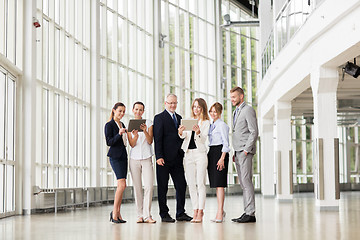 Image showing business people with tablet pc computers at office