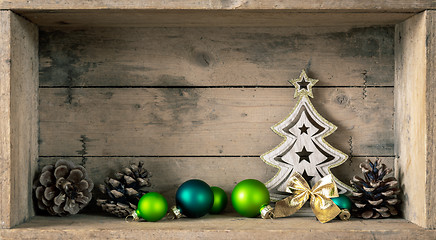 Image showing Christmas symbols decoration green glass balls and fir tree 