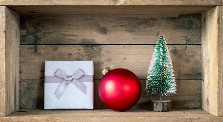 Image showing Christmas symbols decoration gift box red glass ball and fir tre