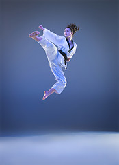 Image showing The karate girl with black belt