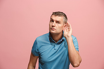 Image showing The happy business man standing and young man listening