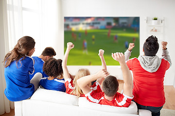 Image showing friends or football fans watching soccer