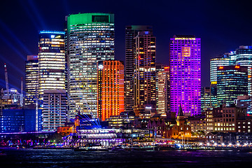 Image showing Sydney\'s city buildings illuminated with colours during Vivid Sy