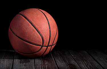 Image showing Basketball ball on a wooden floor