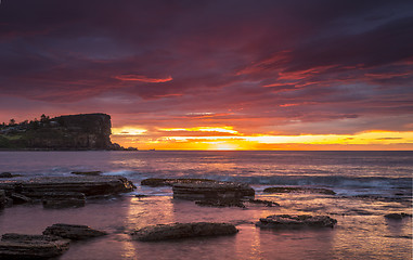 Image showing Coastal sunrise red skies