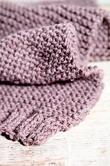 Image showing Knitted brown scarf.