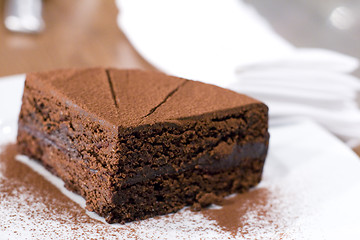 Image showing Piece of chocolate cake on white plate.