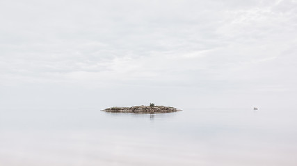 Image showing White Seascape - Natural Background With Small Isolated Island