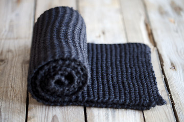 Image showing Hand knitted black scarf.