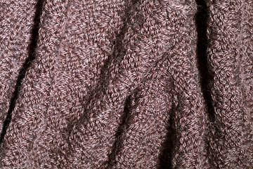 Image showing Knitted brown scarf texture.