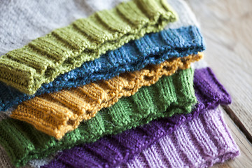 Image showing Multicolor knitted hats stack.