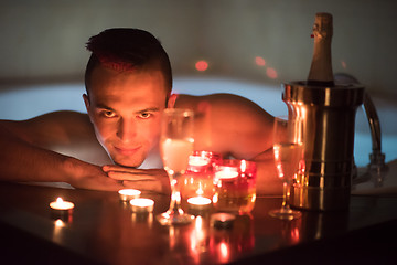 Image showing man relaxing in the jacuzzi